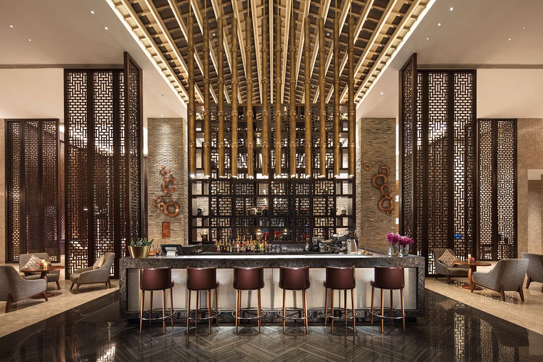 Treat yourself to a refined afternoon of tea and cakes in the lobby lounge with the classic oriental scene.
The cultural aesthetics are expressed through those reddish-brown wooden wall partitions, and the wall art decoration that resembles the symbol of chinese culture.
.
🎖Our project : Hilton Huizhou Longmen Resort, China
.
.
Leo Design Group
Interior Design • Architectural Services • Pre-construction Services
• Facebook : Leo Design Group
• Website : https://leodesign.group
• Tel : +66 2-261-7733
• Email : contact@leodesign.group
.
#interiordesign #interiordesigner #hospitalitydesign #hoteldesign #luxuryhomes #leodesigngroup